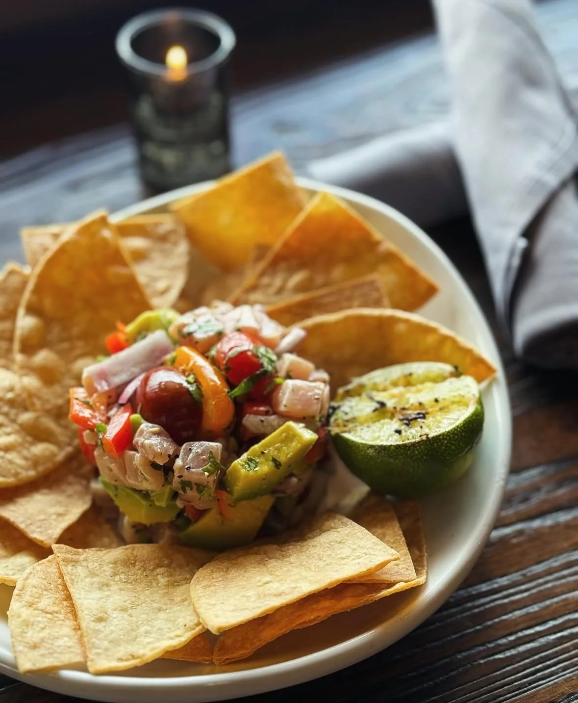 Seafood ceviche with charred lime and crisp tortilla chips, served by candlelight at Whiskey & Water in Blue Ridge, GA