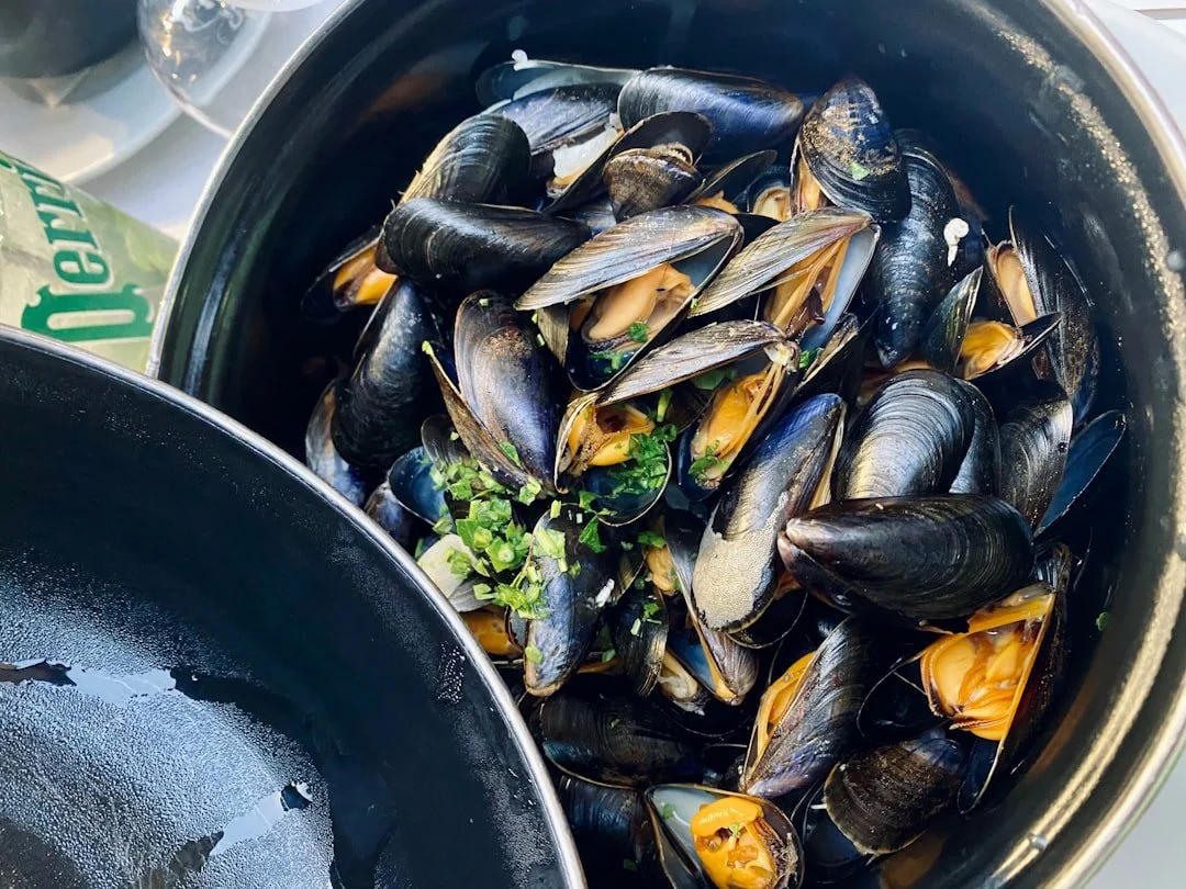 Steamed mussels with fresh herbs at Whiskey & Water, a seafood restaurant in Blue Ridge, Georgia